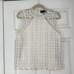 White lace sleeveless blouse